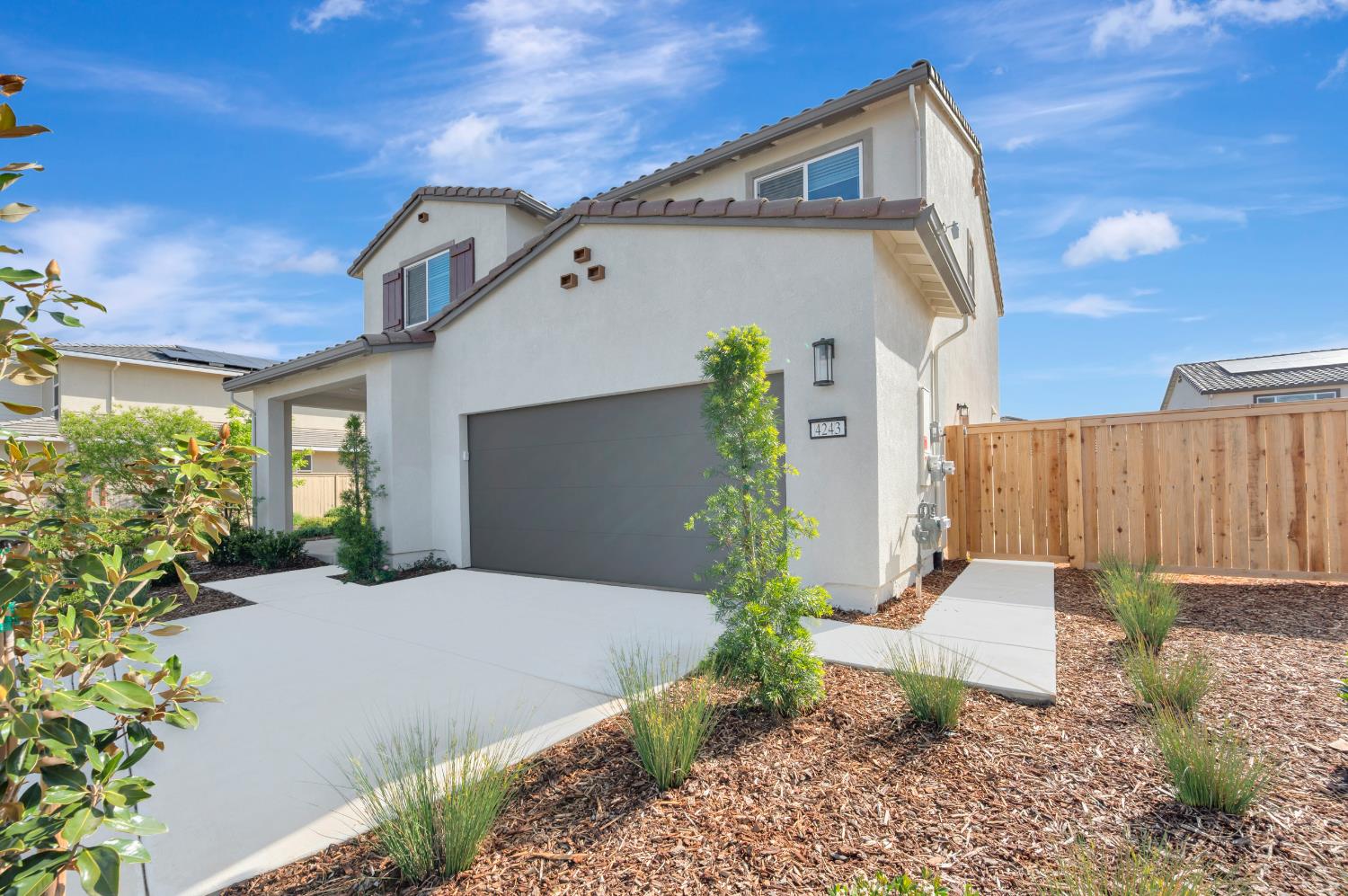4243 Privas Way Rancho Cordova, CA 95742 - Photo 46 of 46 a front view of a house with garden