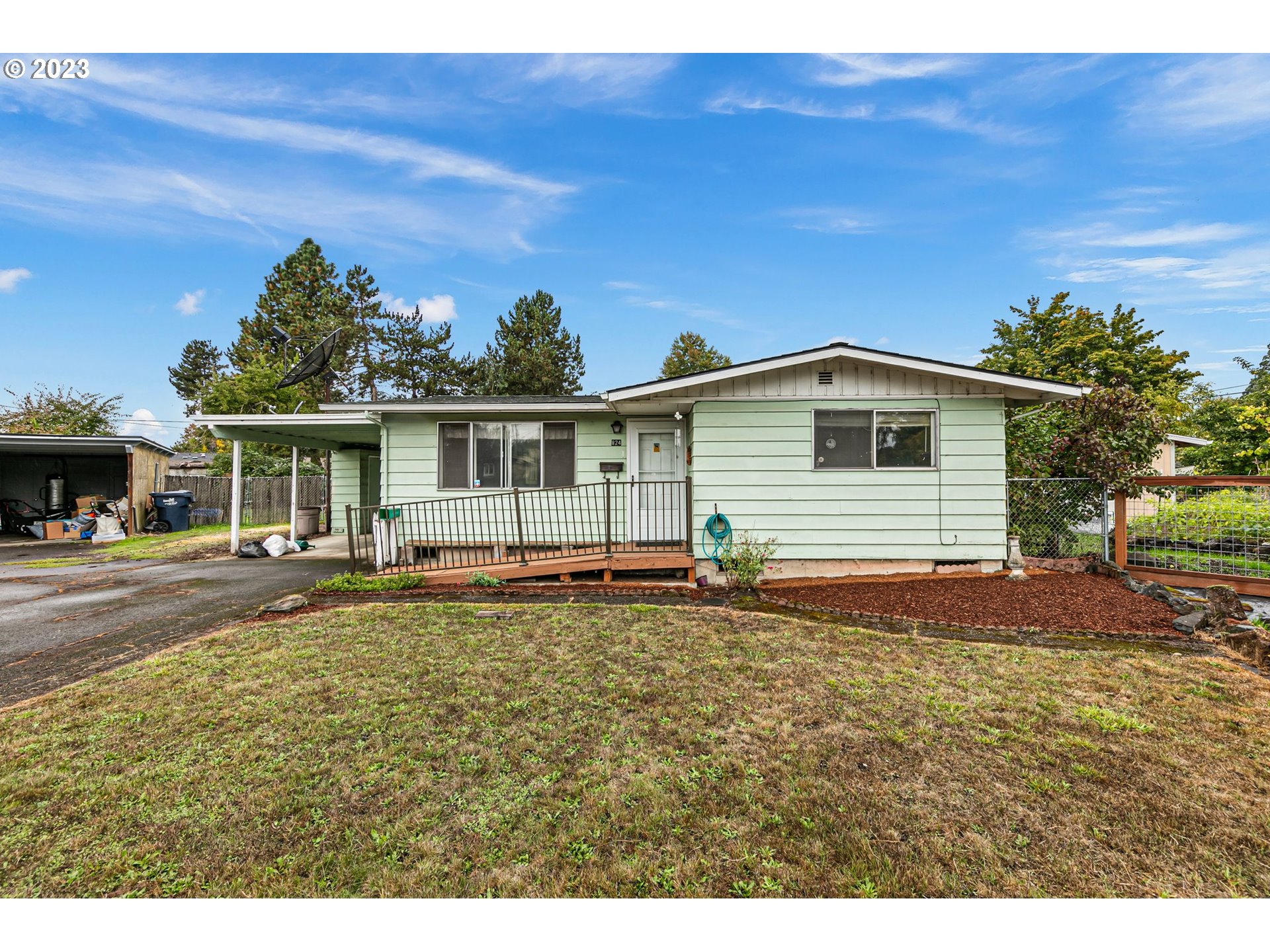 824 20th Street Springfield, OR 97477 - Photo 35 of 44 a view of a house with backyard and sitting area