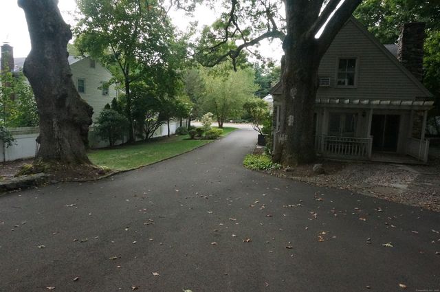 a view of a street from a tree
