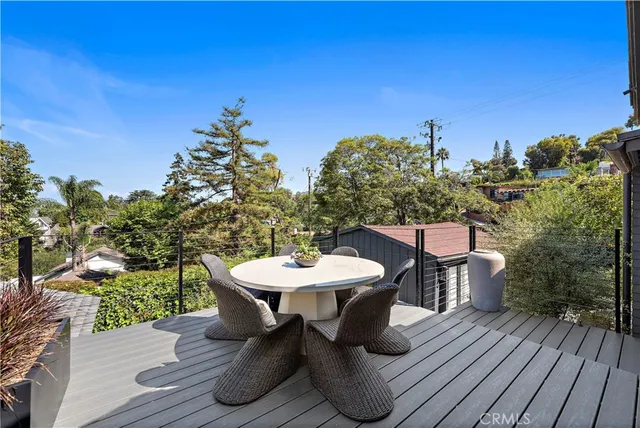 a bed room with a bed mirror and a window