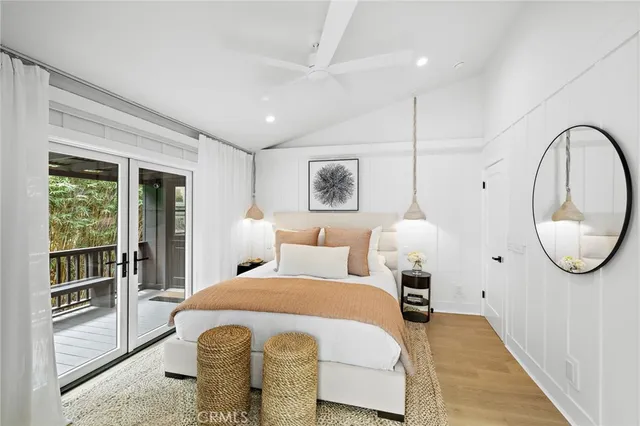 a bathroom with a double vanity sink window and mirror