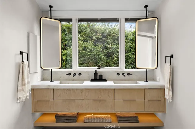 a bathroom with a toilet and a sink