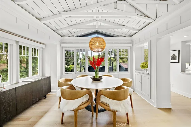 a kitchen with a large window and a sink
