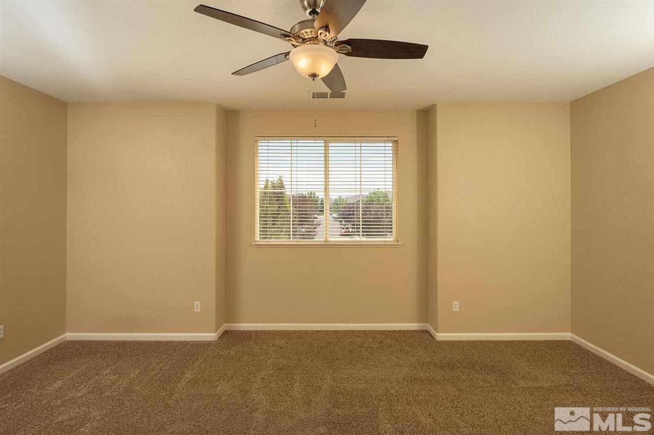 4599 Keyhaven Drive Reno, NV 89502 - Photo 17 of 28 a view of an empty room with a window
