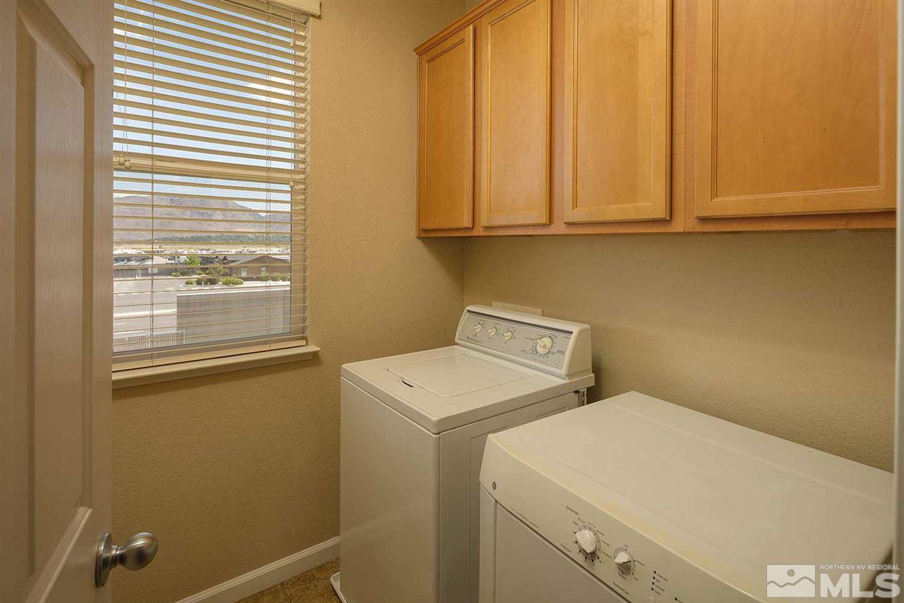 4599 Keyhaven Drive Reno, NV 89502 - Photo 21 of 28 a utility room with dryer and washer
