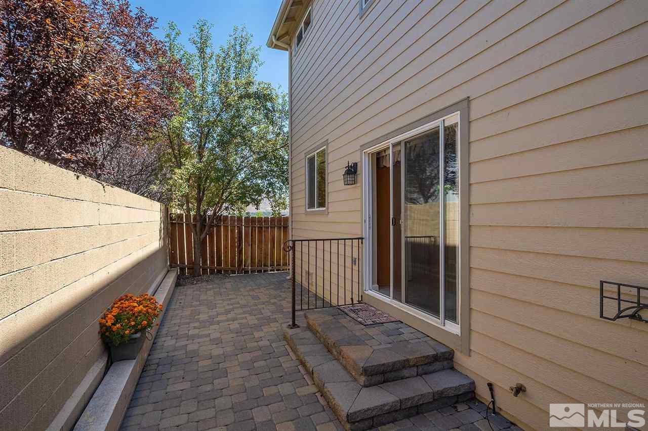 4599 Keyhaven Drive Reno, NV 89502 - Photo 24 of 28 a view of a porch with wooden floor and stairs