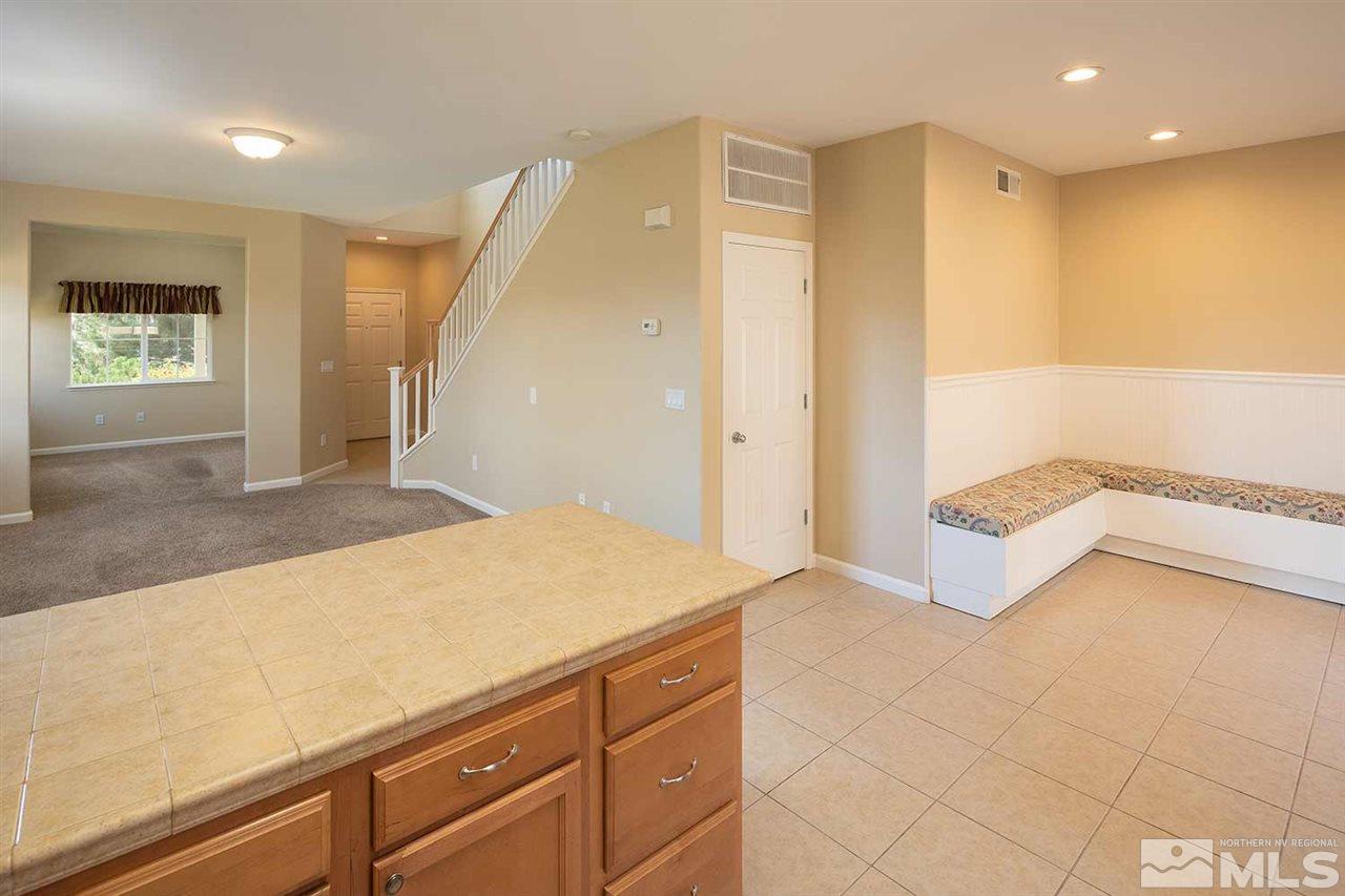 4599 Keyhaven Drive Reno, NV 89502 - Photo 7 of 28 a spacious bathroom with a granite countertop sink
