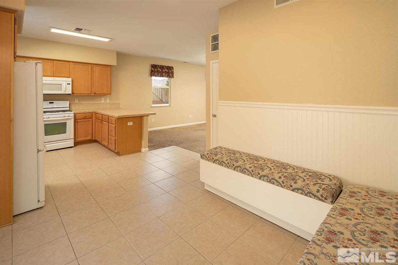 4599 Keyhaven Drive Reno, NV 89502 - Photo 9 of 28 a large bathroom with a tub a sink and a shower