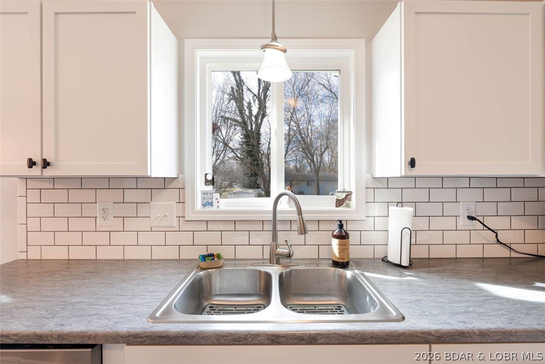 208 East Jemphrey Road Eldon, MO 65026 - Photo 14 of 45 Window over the sink has a distinct view of the ba