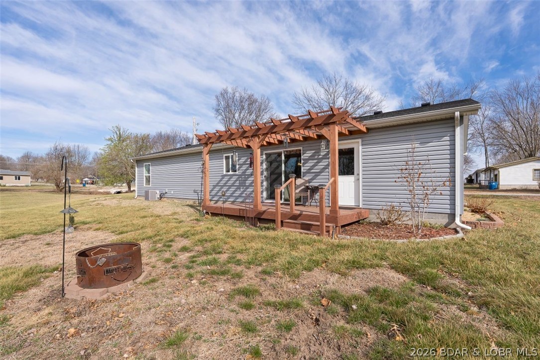 208 East Jemphrey Road Eldon, MO 65026 - Photo 26 of 45 Back of the home. (fire pit not included).