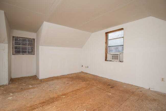 82 Deerfield Road Mashpee, MA 02649 - Photo 12 of 16 an empty room with windows