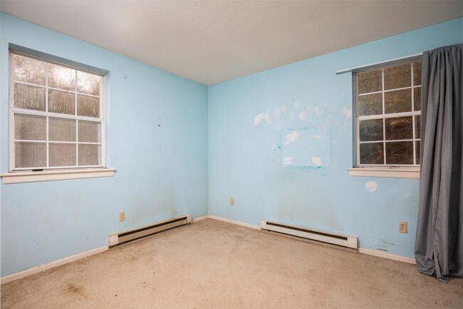 82 Deerfield Road Mashpee, MA 02649 - Photo 10 of 16 an empty room with a window