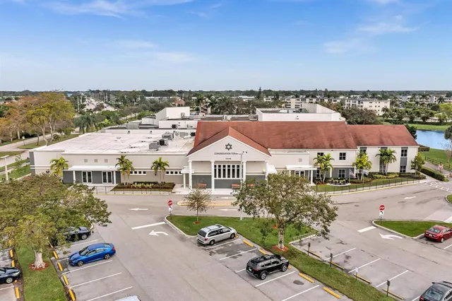 an aerial view of a house with a garden