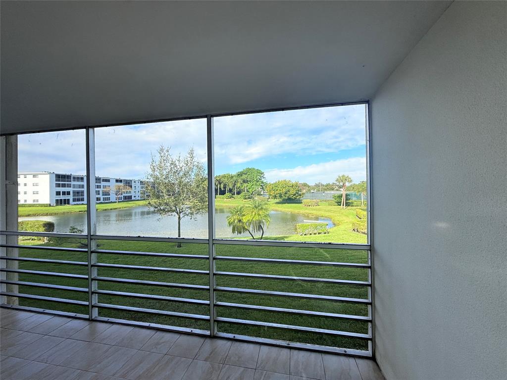 2017 Newcastle A, Unit 2017 Boca Raton, FL 33434 - Photo 28 of 41 a view of a room with a large window
