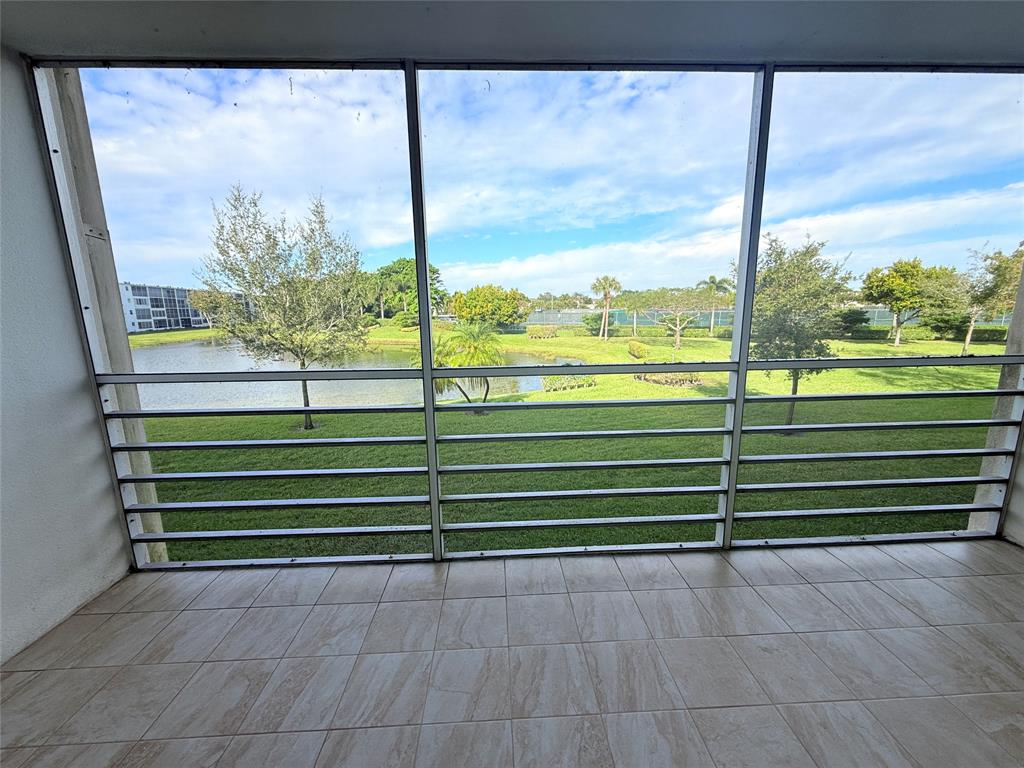 2017 Newcastle A, Unit 2017 Boca Raton, FL 33434 - Photo 29 of 41 a view of a garden from a window