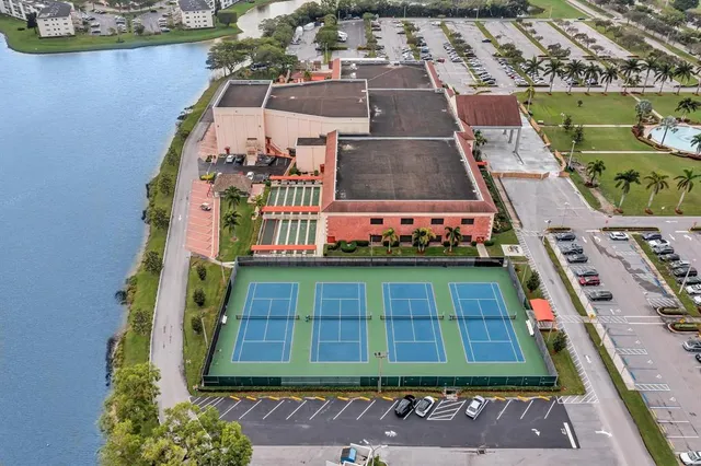 an aerial view of a house with a garden