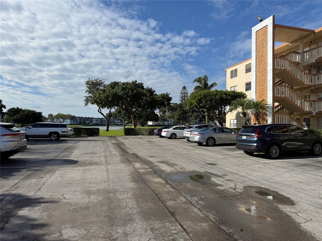 2017 Newcastle A, Unit 2017 Boca Raton, FL 33434 - Photo 6 of 41 a view of street with parked cars