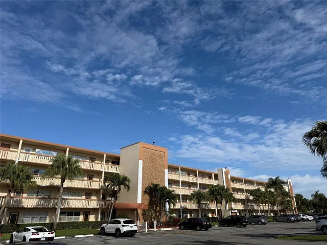 a view of a building with a street