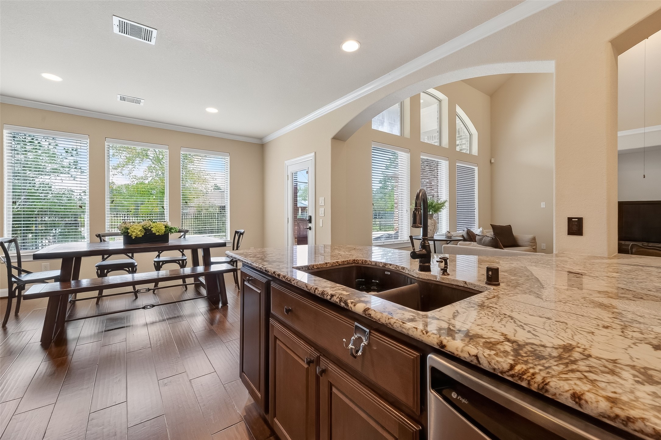 10 Cayuga Pond Court Spring, TX 77389 - Photo 16 of 50 a view of a kitchen counter top space with patio furniture and a granite counter top