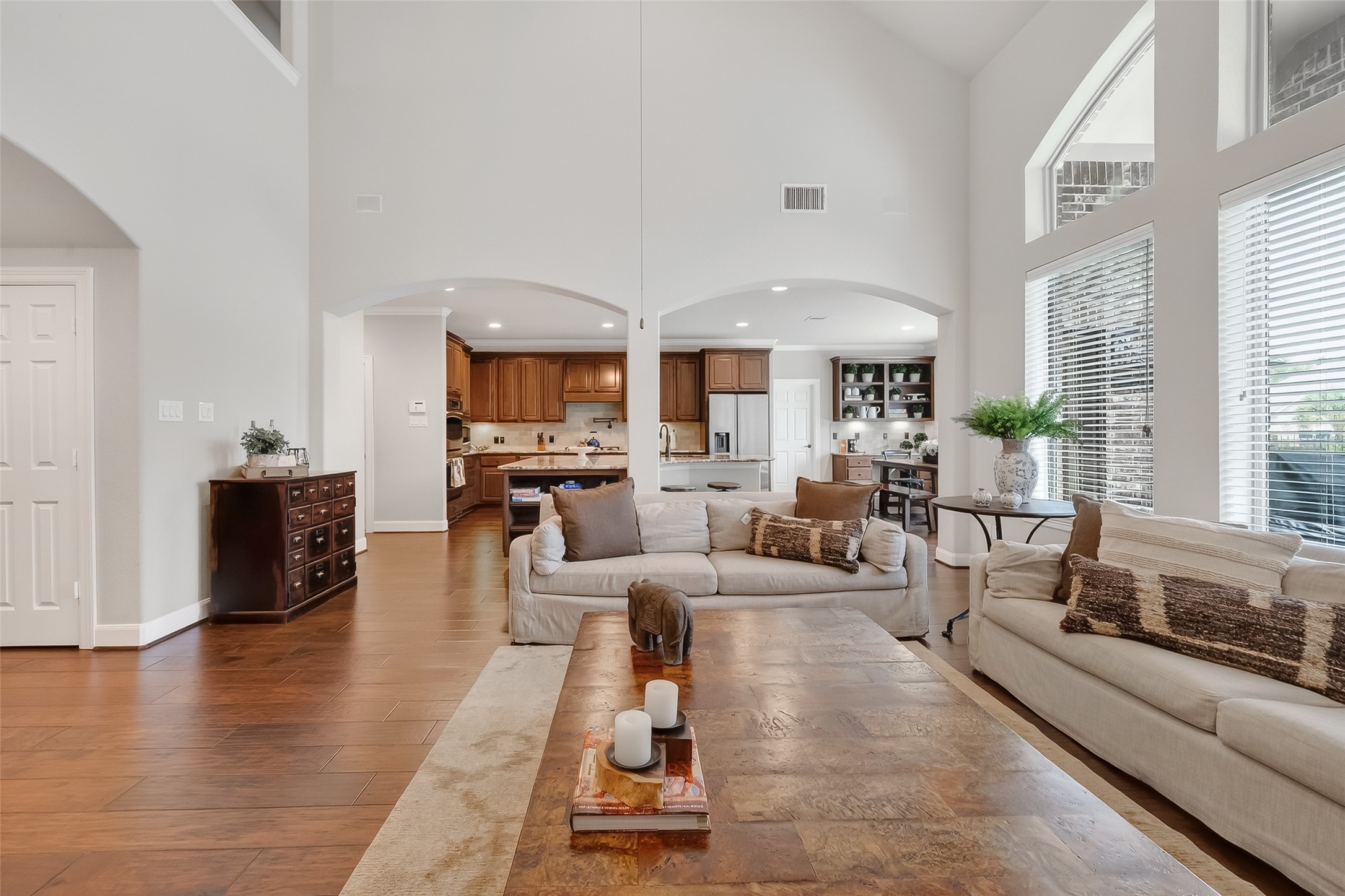 10 Cayuga Pond Court Spring, TX 77389 - Photo 26 of 50 a living room with furniture wooden floor and a large window