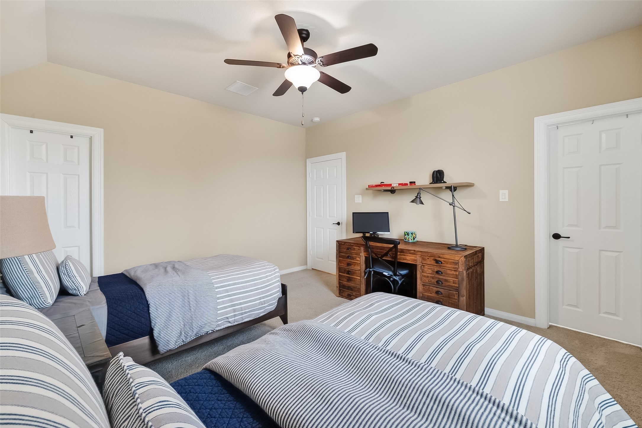 10 Cayuga Pond Court Spring, TX 77389 - Photo 34 of 50 a bedroom with a bed and wooden floor