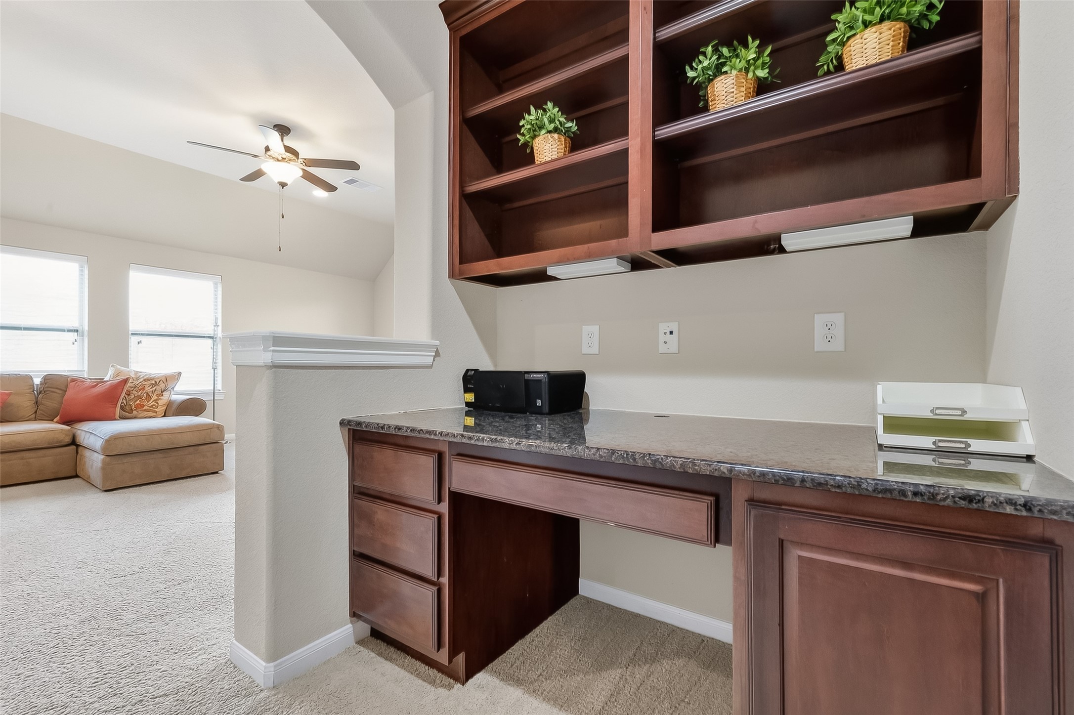 10 Cayuga Pond Court Spring, TX 77389 - Photo 37 of 50 a kitchen with stainless steel appliances granite countertop a stove and a microwave