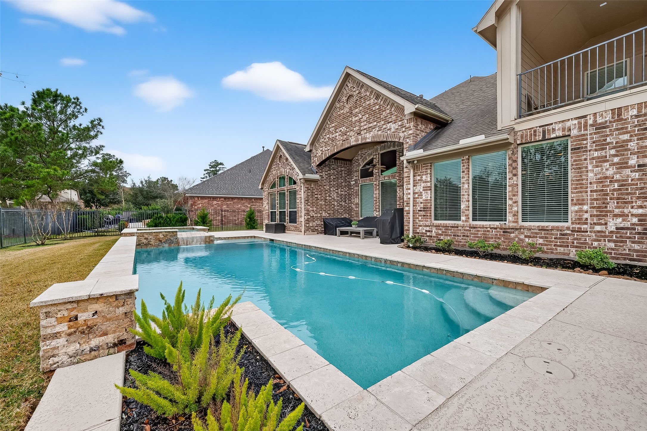 10 Cayuga Pond Court Spring, TX 77389 - Photo 48 of 50 a view of a house with swimming pool