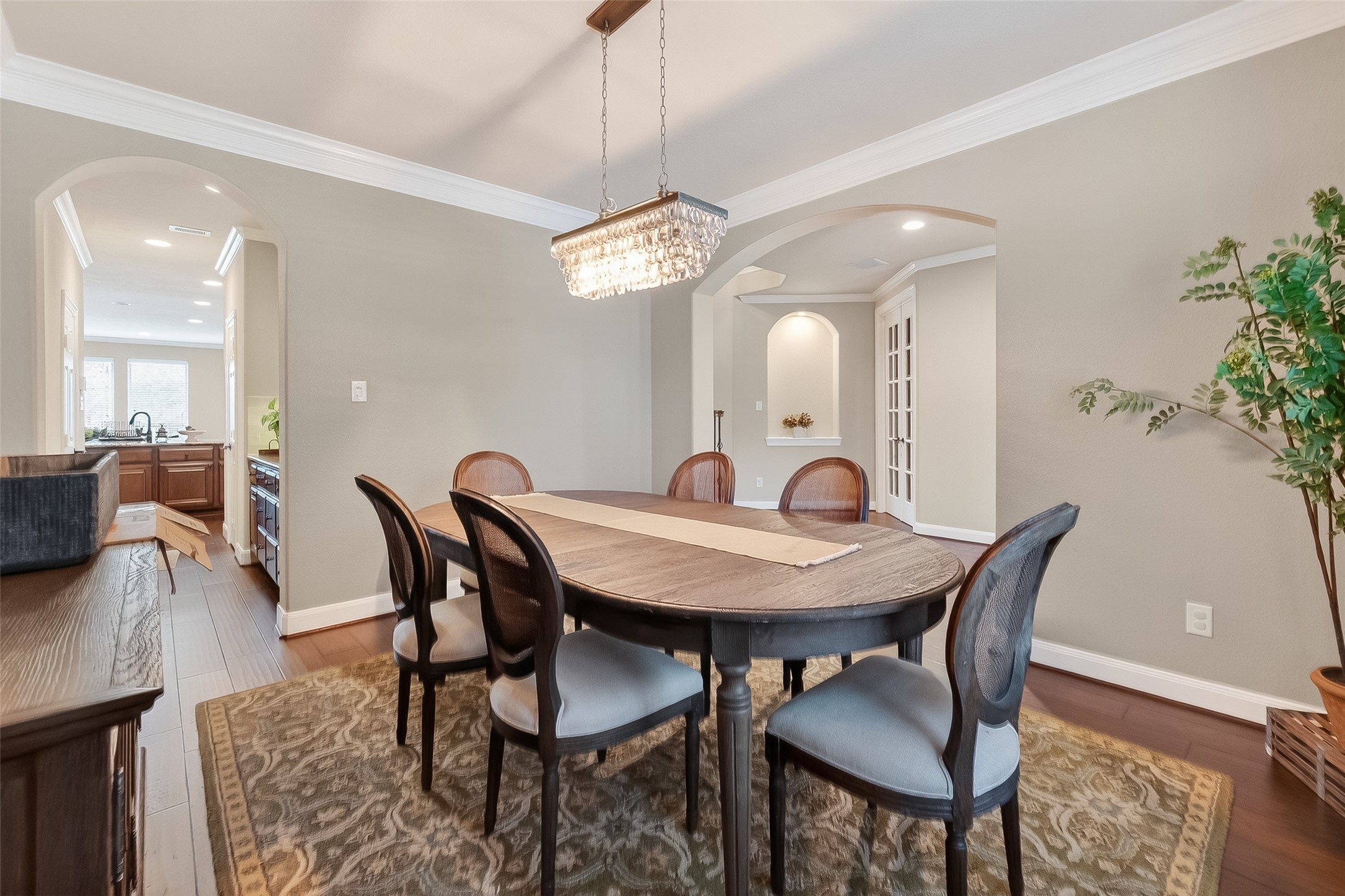 10 Cayuga Pond Court Spring, TX 77389 - Photo 9 of 50 a view of a dining room with furniture and wooden floor