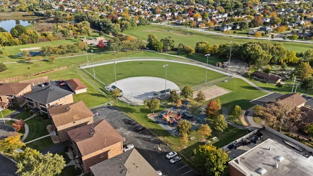 an aerial view of a house with a ocean view