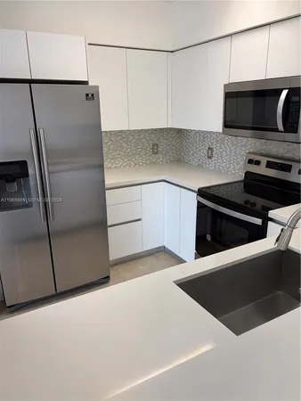 a close up view of washer and dryer