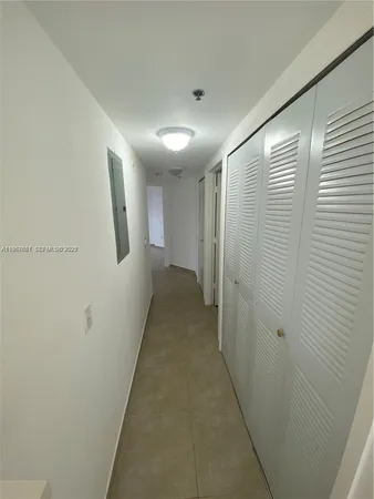 a view of a workspace with furniture