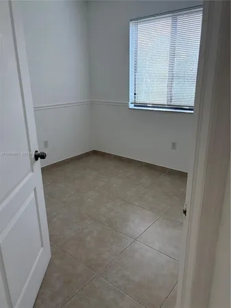 a view of a yard with plants