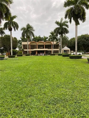a view of a garden with a fountain