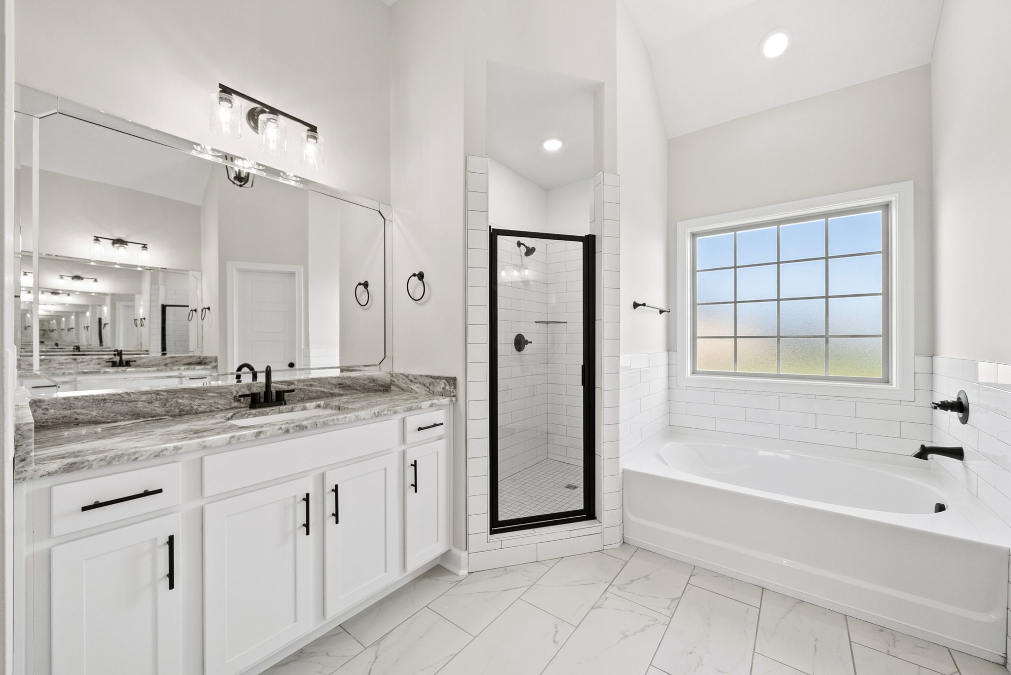 571 Fieldview Way Clarksville, TN 37043 - Photo 23 of 48 a bathroom with a granite countertop sink mirror bathtub and next