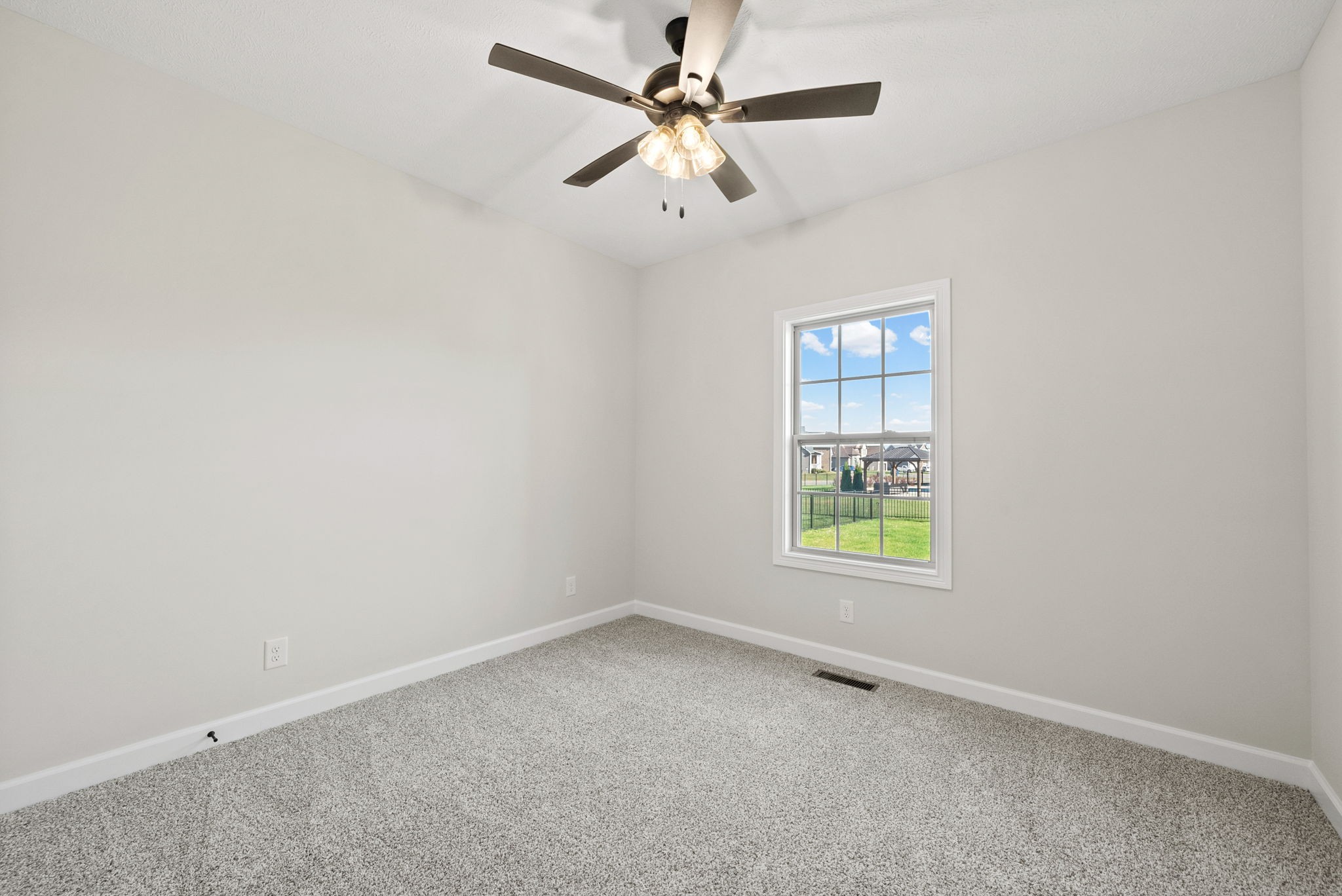 571 Fieldview Way Clarksville, TN 37043 - Photo 31 of 48 an empty room with a window and a ceiling fan