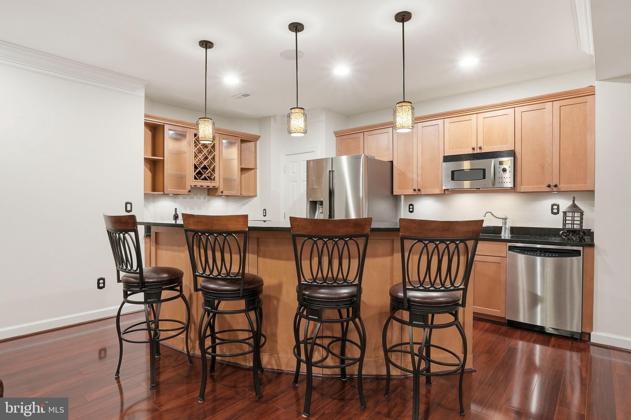 206 May Lane Edgewater, MD 21037 - Photo 45 of 66 Modern kitchen with elegant bar seating.