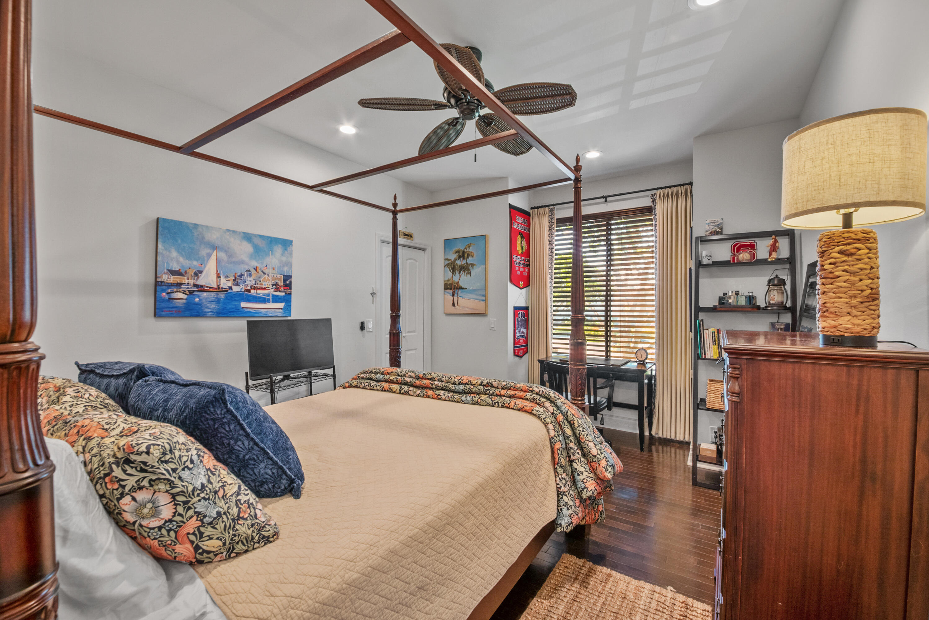 19199 Sabal Lake Drive Boca Raton, FL 33434 - Photo 13 of 40 a bedroom with a bed a dresser and a painting on the wall