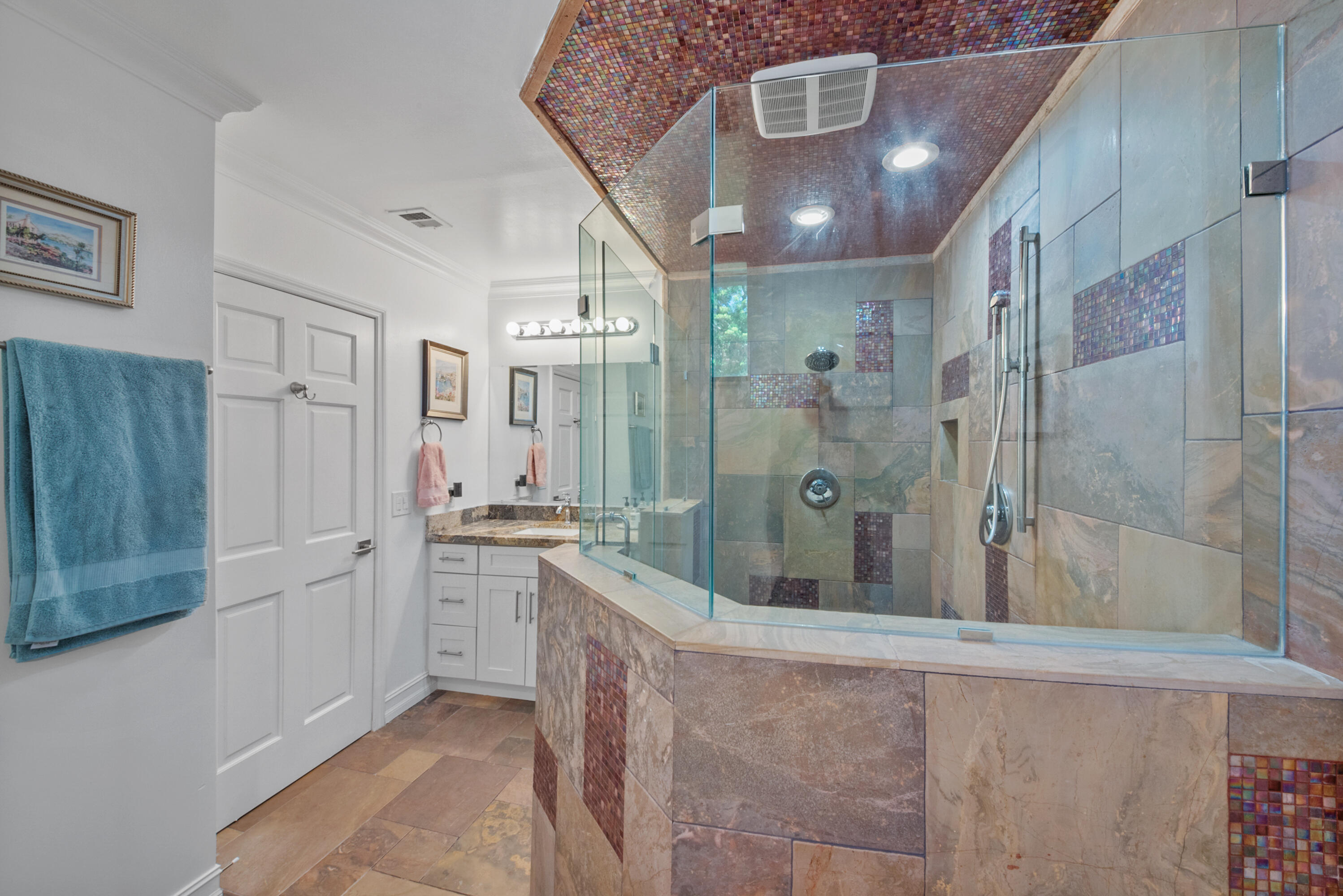 19199 Sabal Lake Drive Boca Raton, FL 33434 - Photo 20 of 40 a bathroom with a glass shower door