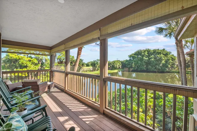 a front view of a house with garden space and street view