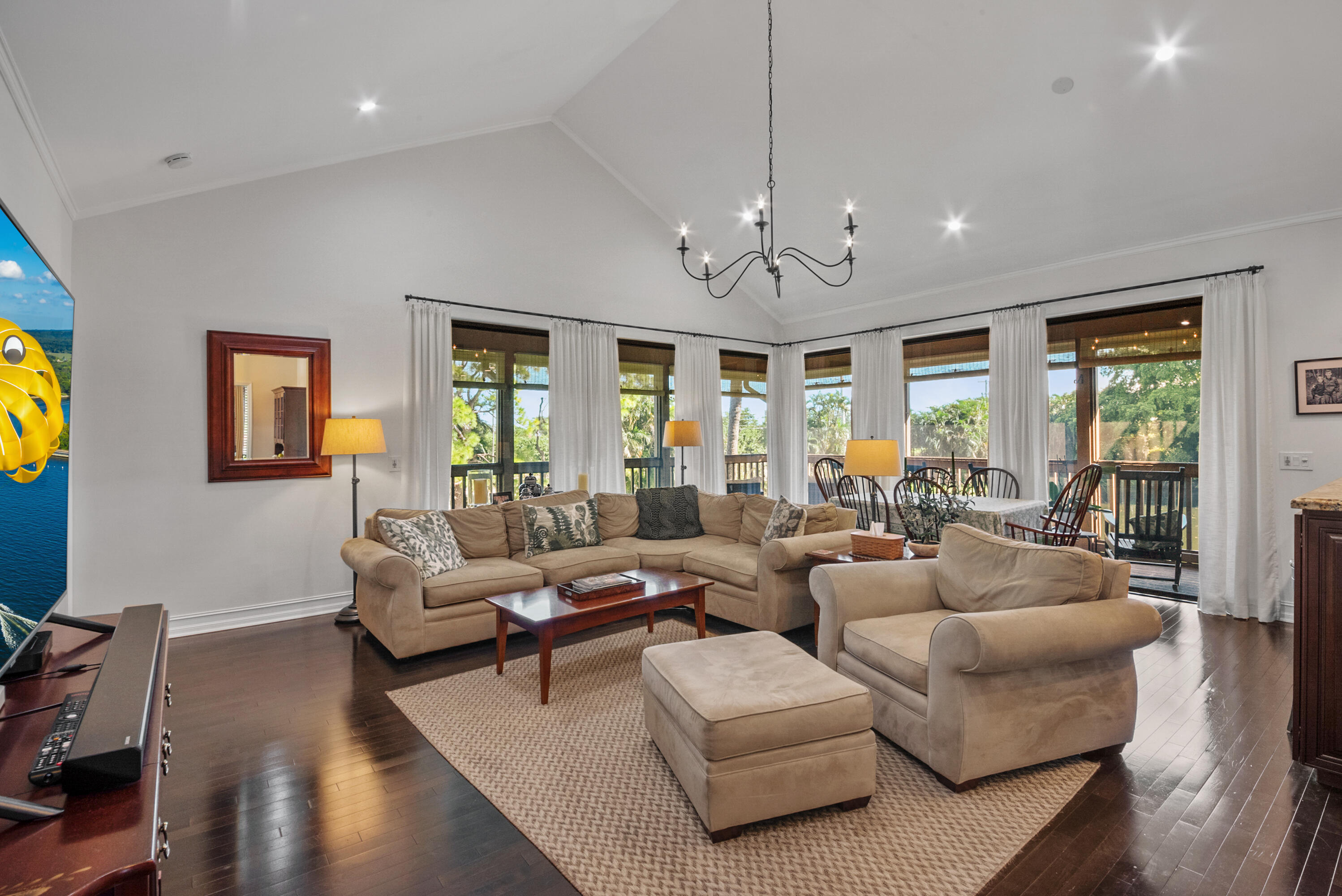 19199 Sabal Lake Drive Boca Raton, FL 33434 - Photo 3 of 40 a living room with furniture ceiling fan and a window