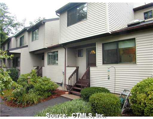 539 Cypress Road, Unit 539 Newington, CT 06111 - Photo 1 of 1 Exterior Front. perrenial plantings & newer storm door