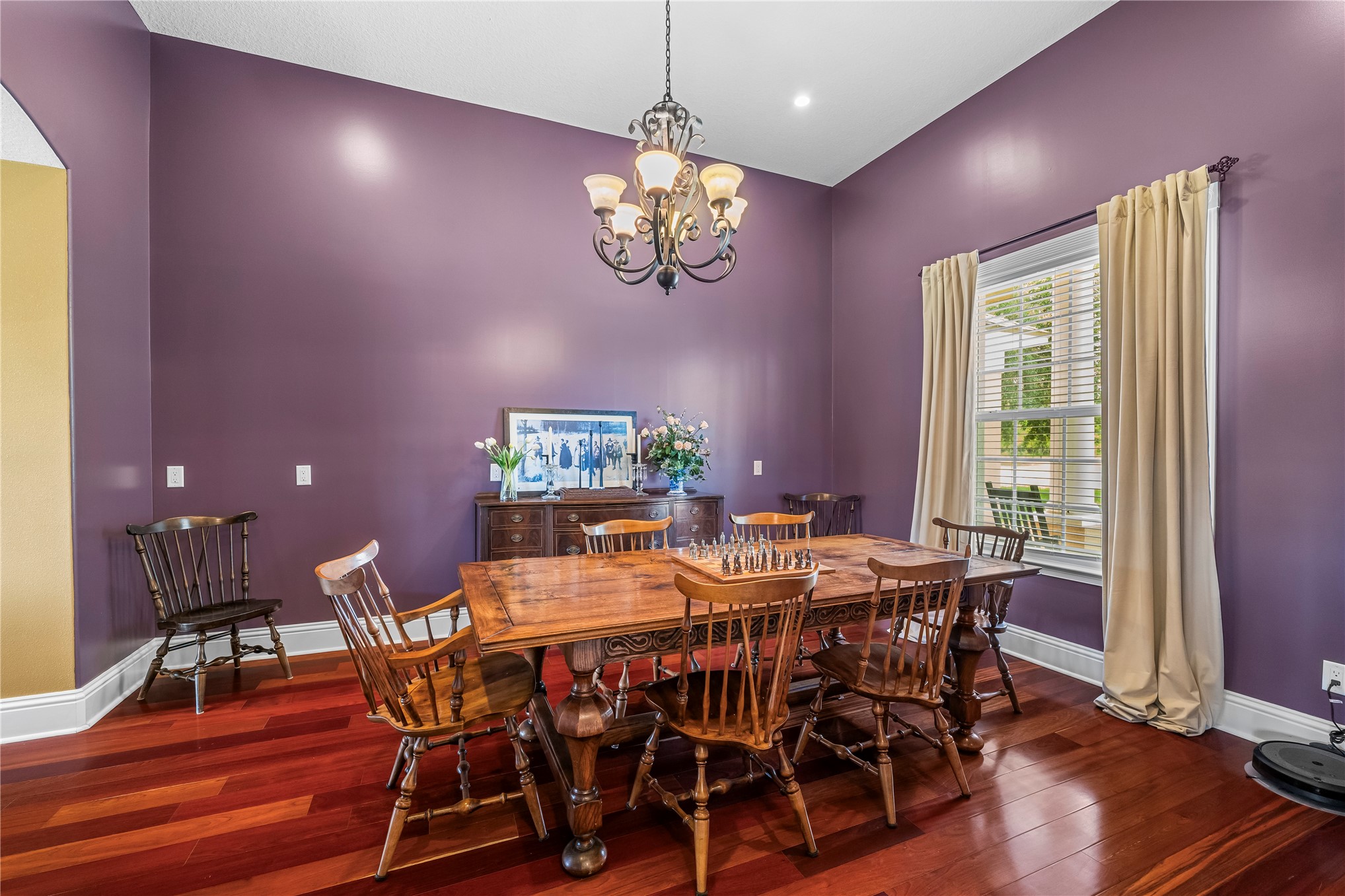 27247 Hallman Road Hilliard, FL 32046 - Photo 25 of 59 a view of a dining room with furniture window and wooden floor