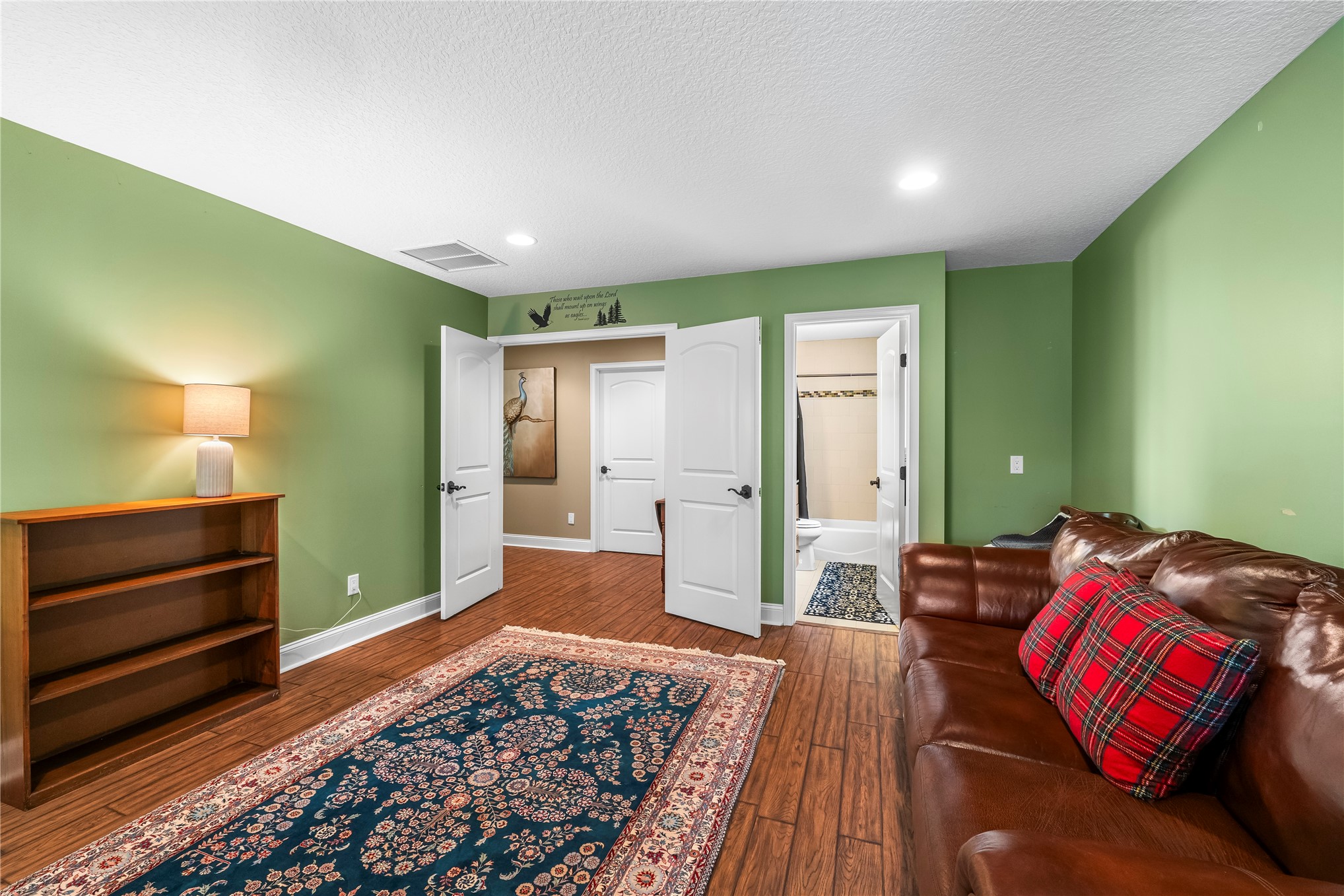27247 Hallman Road Hilliard, FL 32046 - Photo 45 of 59 a spacious bedroom with a bed and a dresser