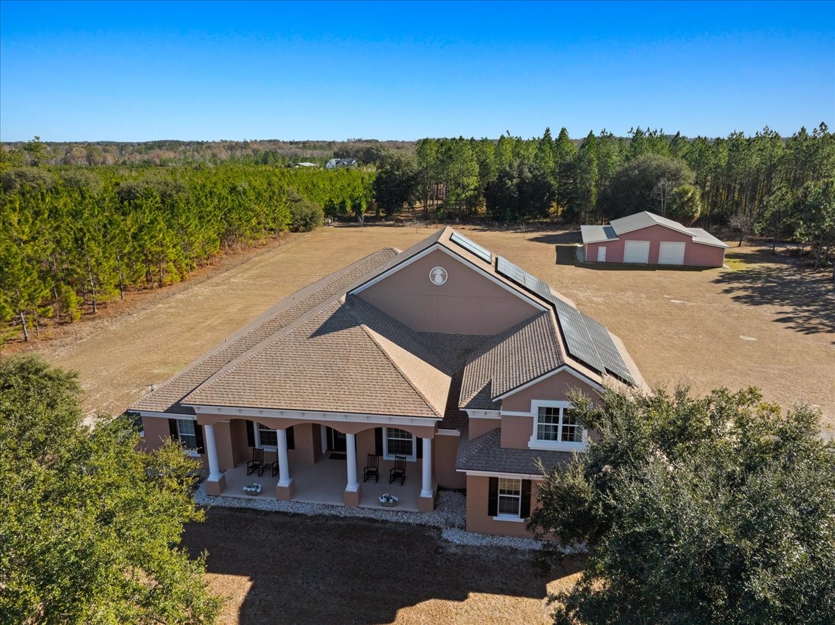 27247 Hallman Road Hilliard, FL 32046 - Photo 5 of 59 a aerial view of a house with a big yard