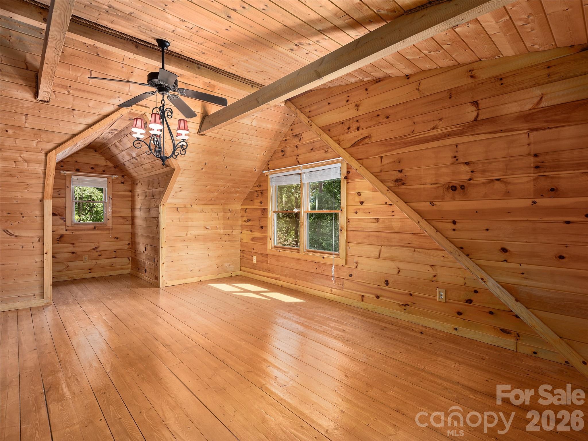 413 Green Hills Road Mill Spring, NC 28756 - Photo 29 of 48 a view of a house with a wooden deck
