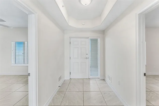 a bathroom with a granite countertop sink mirror toilet and shower