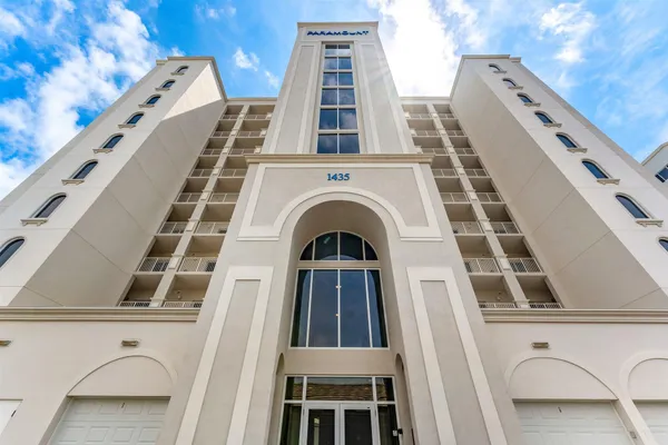 a view of a building with a balcony
