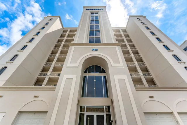 a view of a building with a balcony