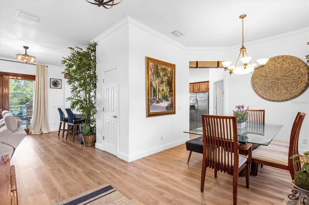 2975 West Osceola Road Geneva, FL 32732 - Photo 14 of 45 a view of a dining room with furniture window and wooden floor