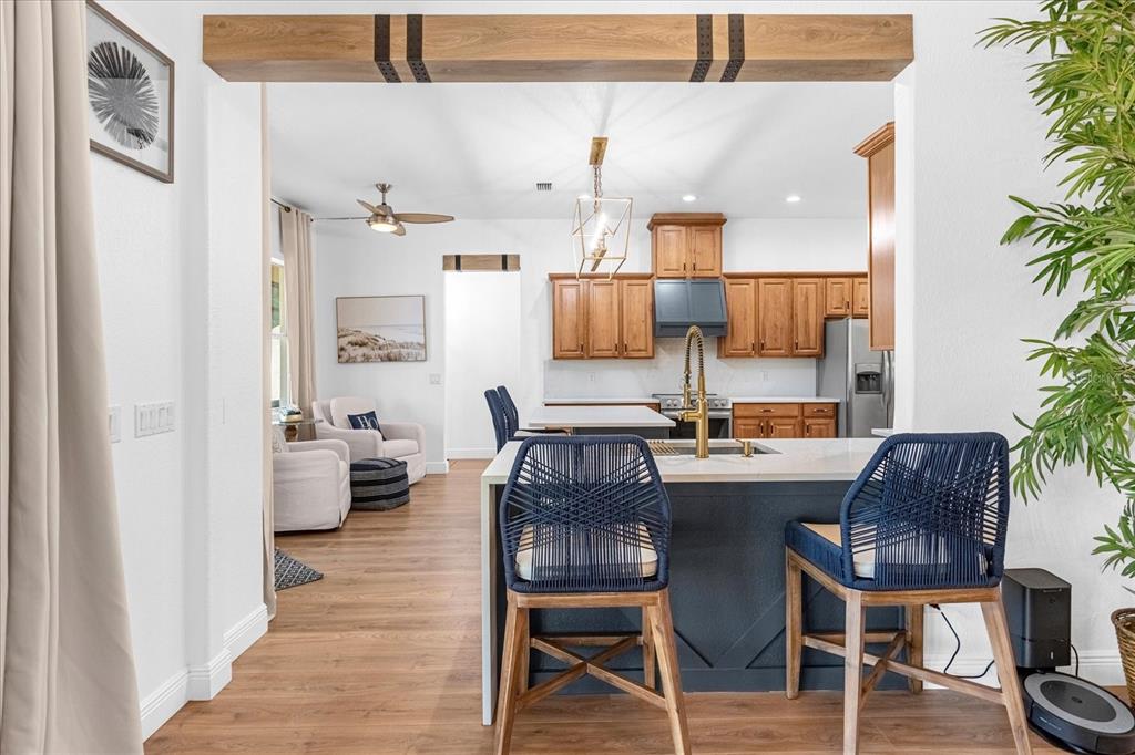 2975 West Osceola Road Geneva, FL 32732 - Photo 19 of 45 a dining room with furniture and wooden floor